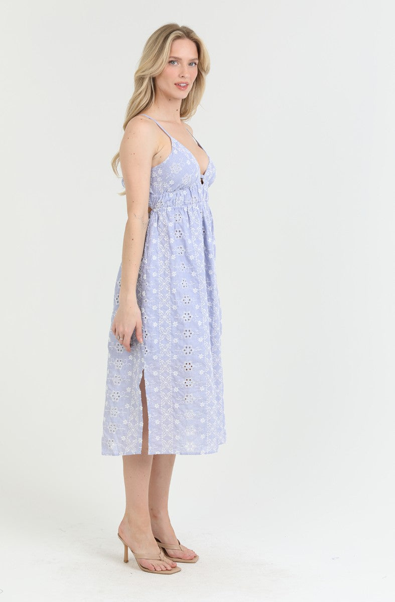 light blue eyelet midi dress with a deep V-neck and tie-back detail
