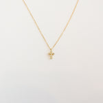 18K gold-plated 925 sterling silver dainty cross necklace with cubic zirconia accents on a delicate chain, perfect for everyday wear and faith-inspired jewelry.