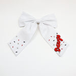 Go Team Bow - Oversized collegiate-style bow in Georgia bulldogs script team colors, perfect for game days, tailgates, and spirited outfits. Features a sturdy alligator clip for secure wear.