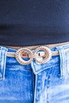 Stylish gold stretch belt with a statement buckle, perfect for elevating jeans, dresses, and blazers with a polished, sophisticated touch.