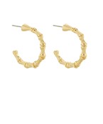 A pair of gold-tone bamboo hoop earrings featuring a textured design, lightweight and perfect for effortless elegance.