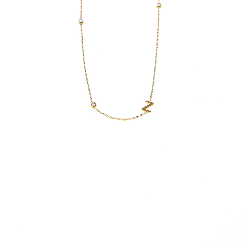 Gold initial necklace with a delicate Z charm and cubic zirconia accents on a dainty chain, perfect for a personalized and elegant look