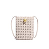 woven handbag with gold ball closure