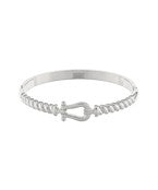 Gold and silver nautical knot bangle featuring a sleek rope-knot accent, designed for a classic and sophisticated look