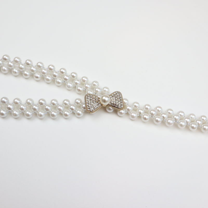 Elegant pearl stretch belt with jeweled accent and classic pearl detailing—perfect for formal occasions, bridal wear, or adding a touch of glamour to everyday outfits.