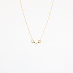 Snaffle Bit Necklace featuring equestrian-inspired charm