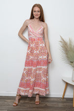  floral maxi dress with a twist-front design, smocked back, and a flowy silhouette